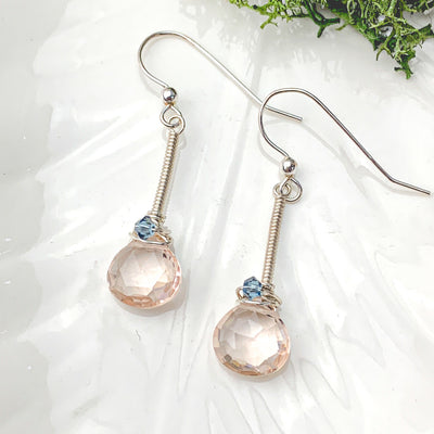 eve earrings with heart shape gem